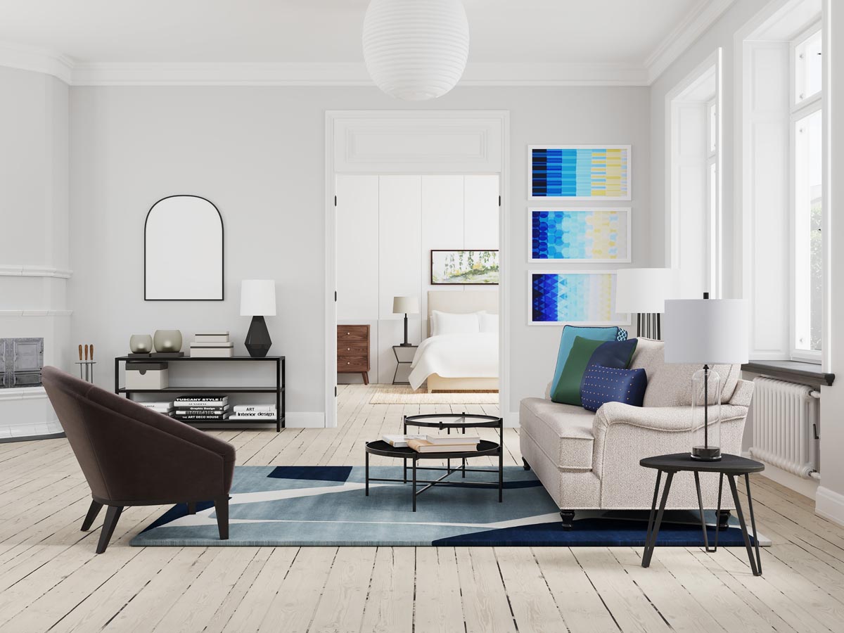 Living room with beige sofa and blue accents, art on wall