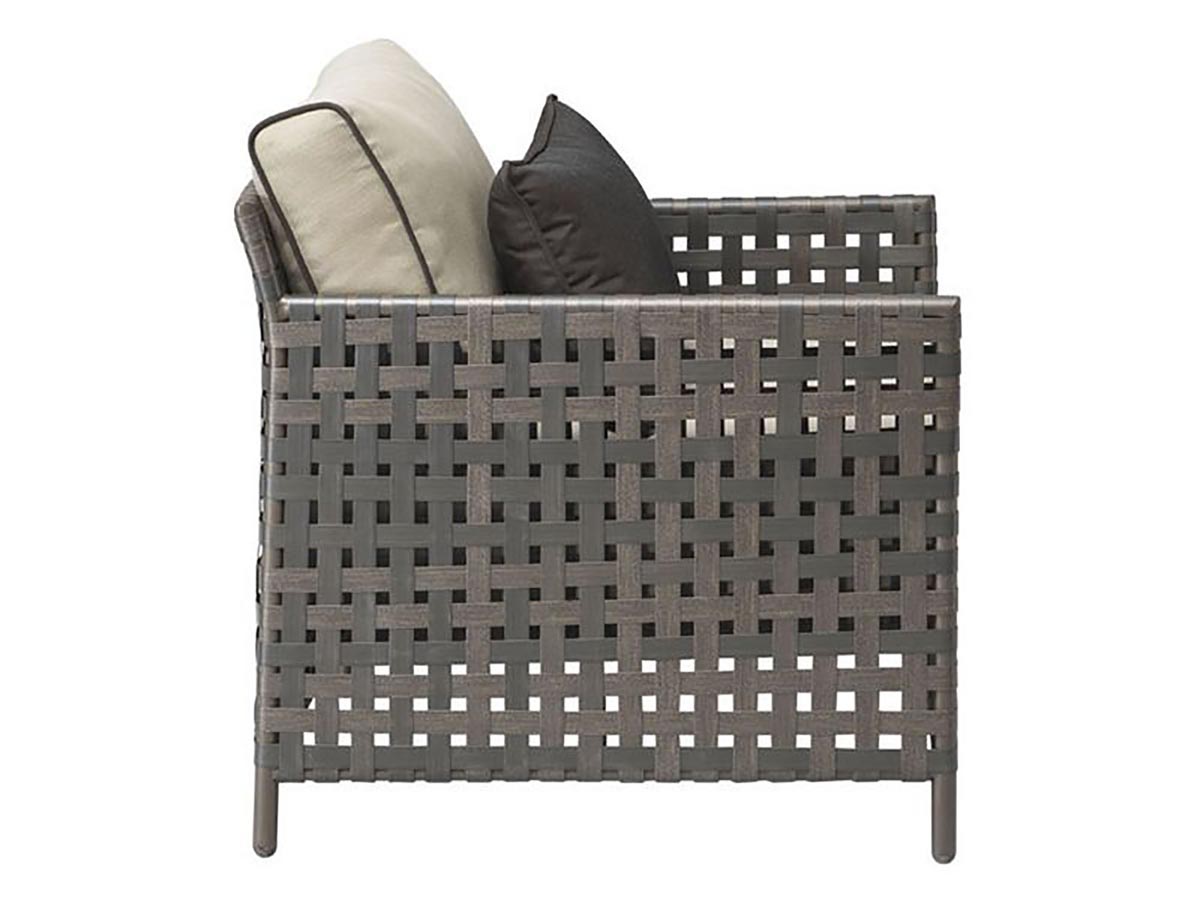 Rear/side angle view of Pinery Arm Chair showing woven sides