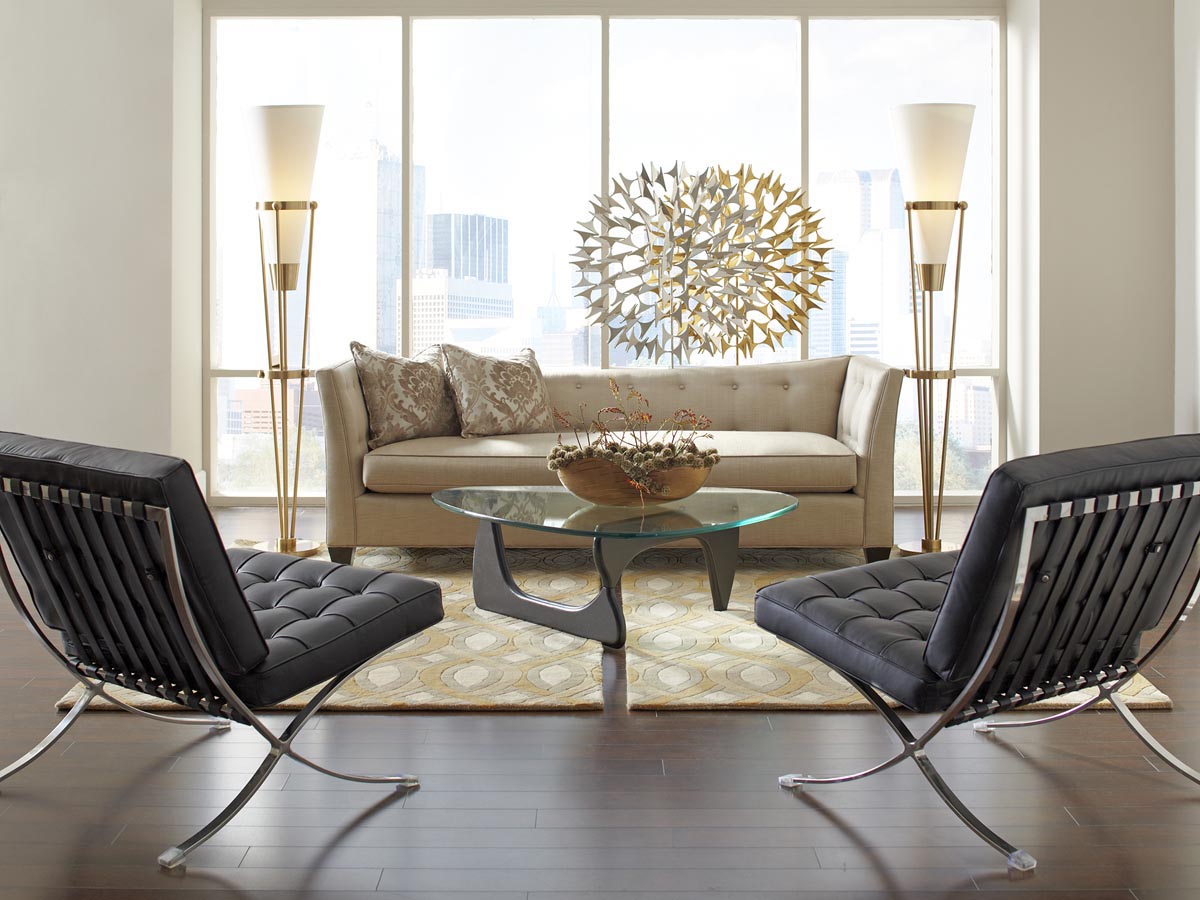 Marco chairs facing a sofa in a bright living room