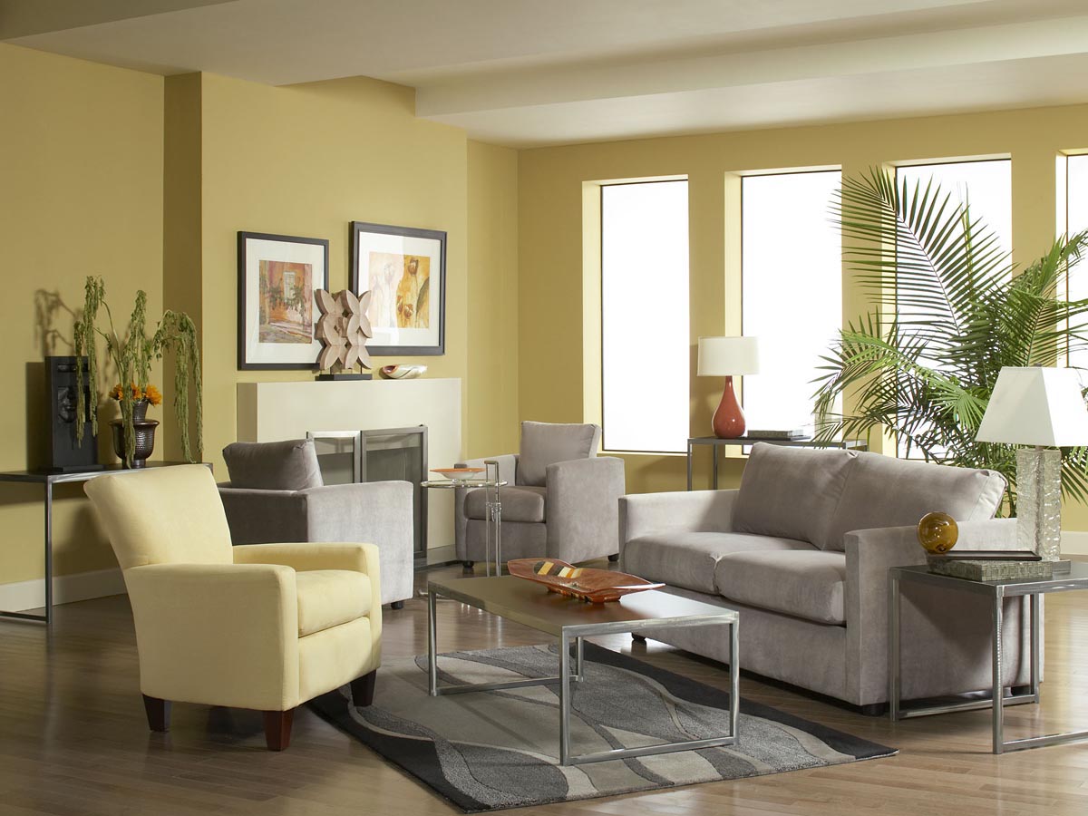 Set of matching metal-framed tables with black tops in a lounge