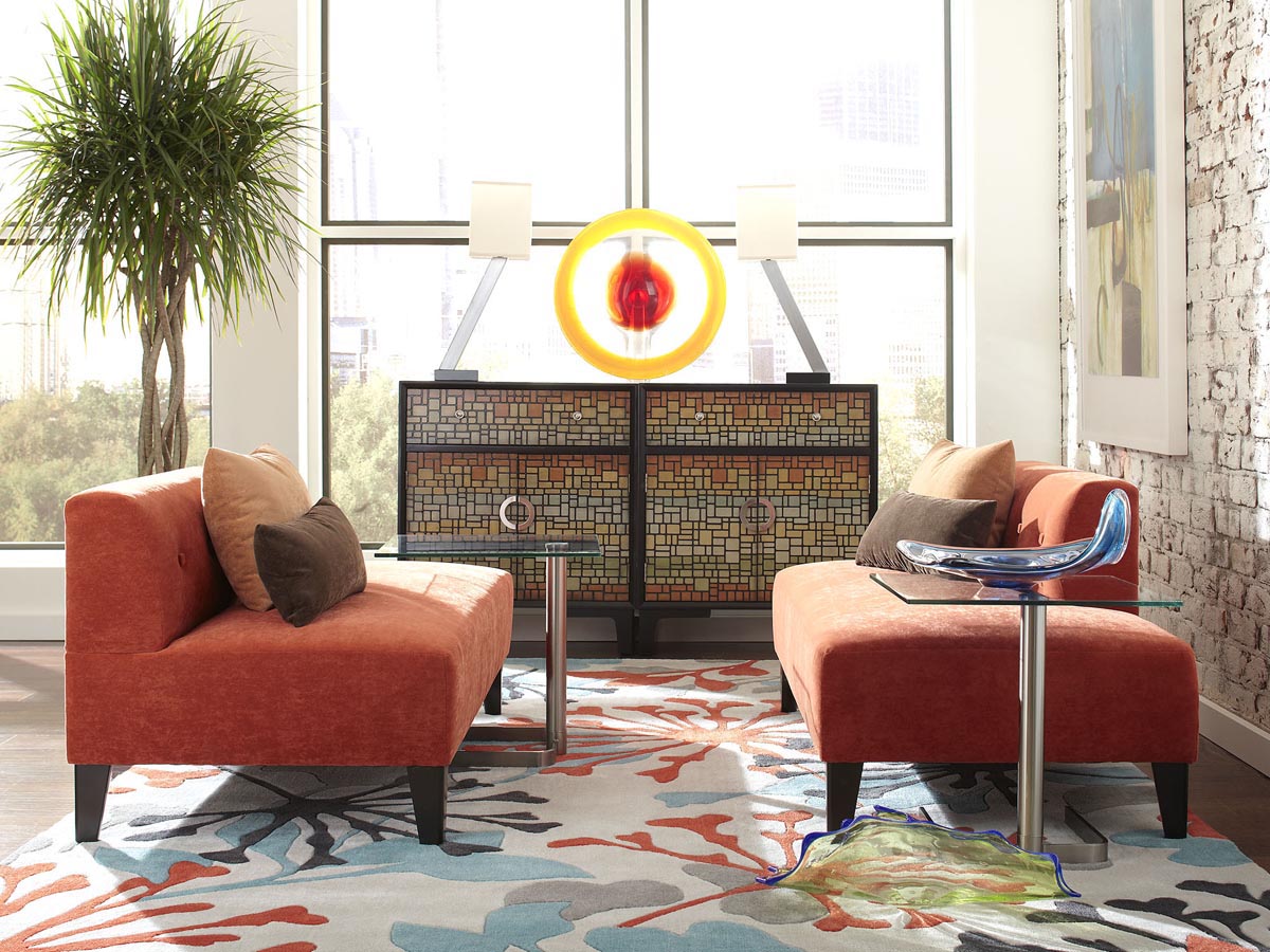 Glass top end table in living room with decorative items