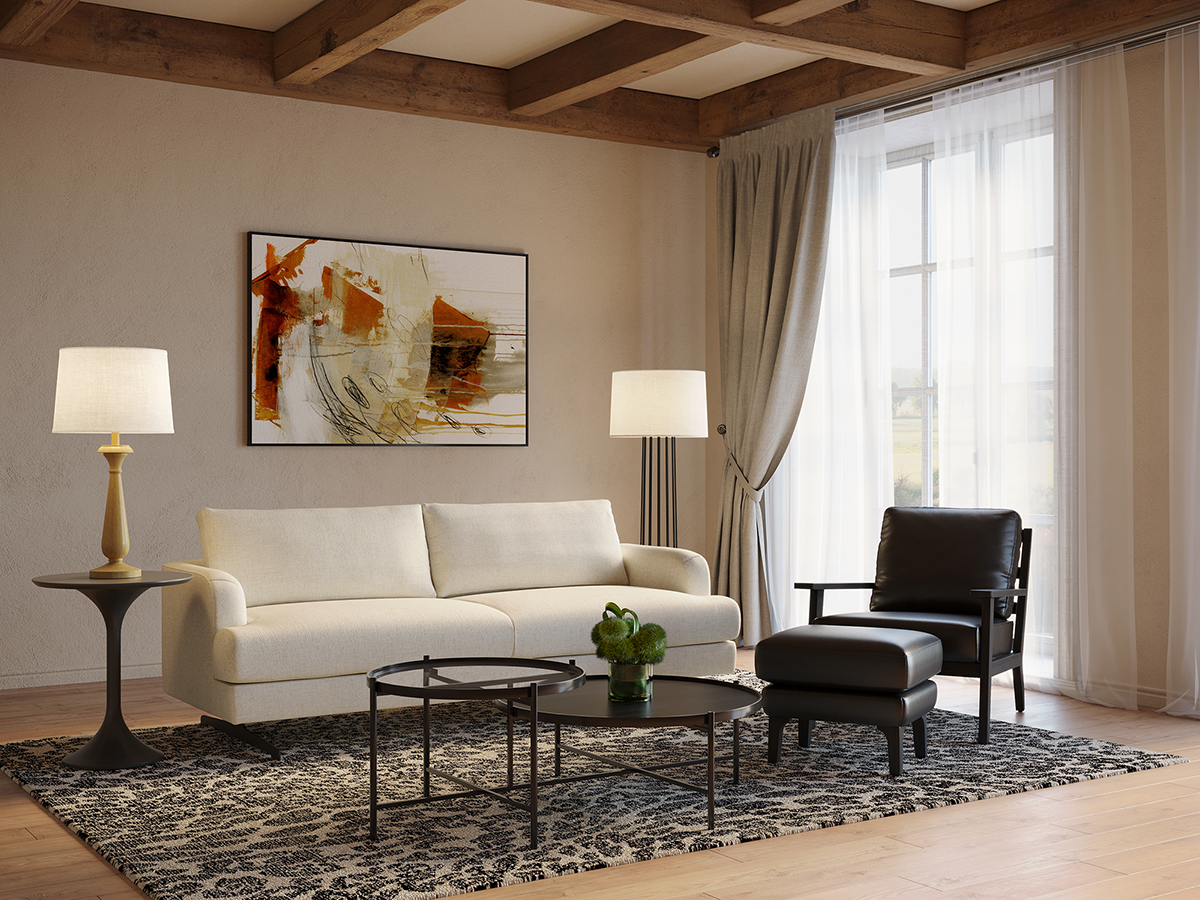Living room setup with beige sofa and black leather chair and ottoman