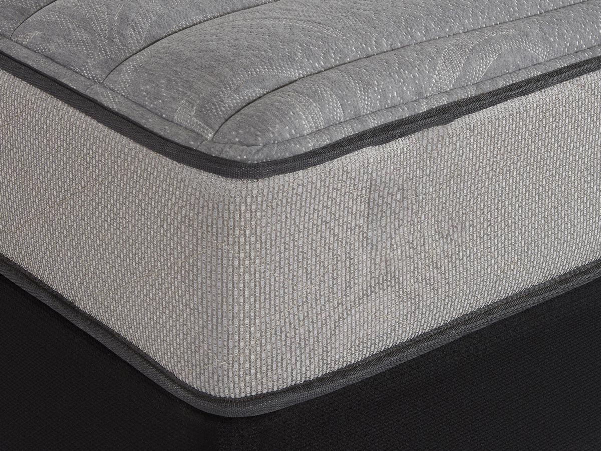 Close-up of corner seam and fabric texture of mattress side